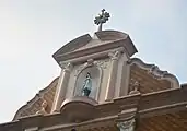 The pediment of the church located on the topmost portion of the façade