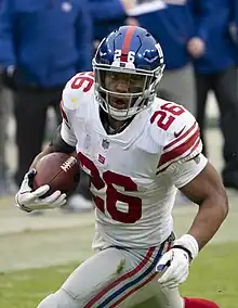 Saquon Barkley playing for the New York Giants in 2018