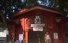 White coloured temple shrine located in Sarasbaug