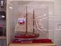 Model ship in trophy case.