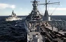 Schleswig-Holstein (D-182) and USS Iowa (BB-61)