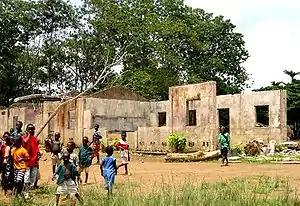 Image 14A school in Koindu destroyed during the Civil War; in total 1,270 primary schools were destroyed in the War. (from Sierra Leone)