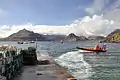 Image 4A boat leaving a slipway stacked with creels in Elgol Bay, Skye, with the Cuillin in the backgroundCredit: Paul Hermans