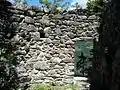 Old castle gate on the west.  It once led to a wooden platform, but now leads to a sheer drop