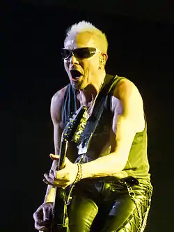 Schenker performing with the Scorpions in 2014