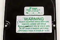 Warranty label on top of a hard disk