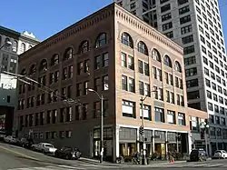 The Collins Block at Second and James; the public library was one of its original 1894 tenants.