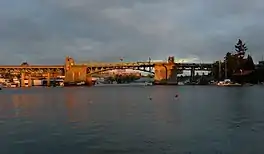 A concrete and steel bridge crossing over a body of water