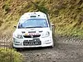 Lindholm driving his Suzuki SX4 WRC at the 2007 Rally GB.