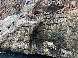 Climbers seen from the sea