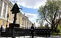 Honor Guards of the Kremlin Regiment in formation behind the monument