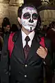 Man with sugar skull make-up photographed in Mexico City, celebrating Day of the Dead, 2014.