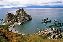 Image 59The Shamanka Шаманка [ru], a holy rock in Shamanism and one of the 9 most holy places in Asia, on the westcoast of Olkhon (from List of islands of Russia)