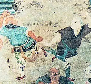 Image 53Depiction of fighting monks demonstrating their skills to visiting dignitaries (early 19th-century mural in the Shaolin Monastery). (from Chinese martial arts)