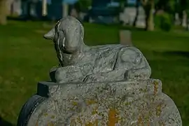 Lamb sculpture on a grave marker