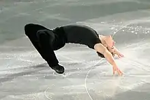 Solo cantilever with hands on ice  (Shawn Sawyer)