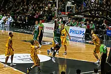 Image 10Lithuanian basketball clubs Žalgiris and Šiauliai playing a match (from Culture of Lithuania)