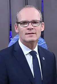 Informal meeting of ministers for foreign affairs (Gymnich). Handshake Sven Mikser, Simon Carbery Coveney and Federica Mogherini (36268525943) Cropped.jpg