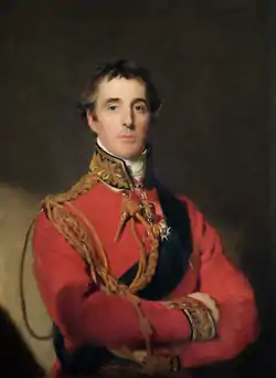 Painting of a man in a red military uniform with his arms folded. He stares directly at the viewer.