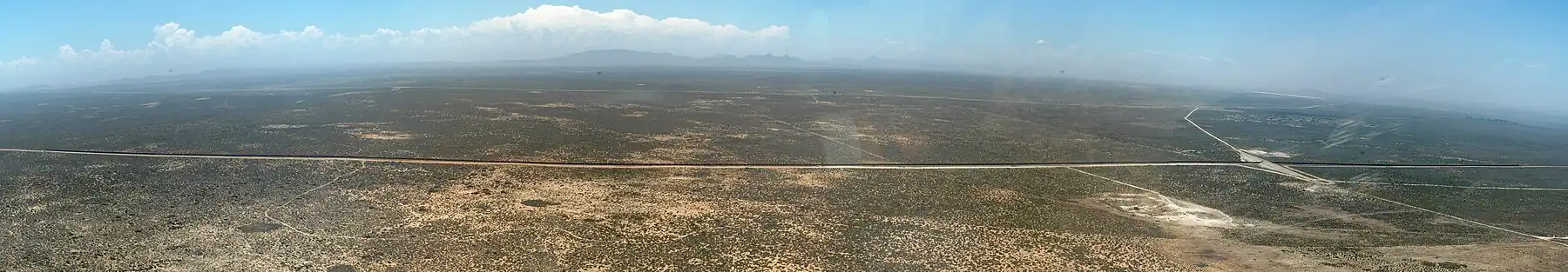 An aerial view of an ore train on the Sishen–Saldanha line.