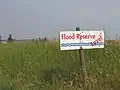 Protest sign near Site C dam site, 2014