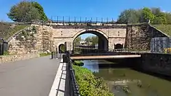 Stone arch railway bridge over River Skerne in Darlington