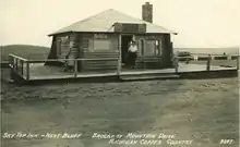 Photograph of Adrian Tousigant standing in the doorway of the