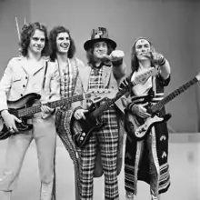 Classic lineup of Slade in November 1973; left to right: Jim Lea, Don Powell, Noddy Holder, and Dave Hill