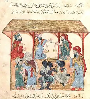 Image 30Slave-market in the town of Zabid in Yemen. Illustration from a 13th century book produced in Baghdad by al-Wasiti (from History of Yemen)