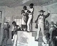 A typical 19th century slave auction in the Southern United States.