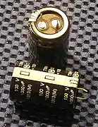 Aluminum electrolytic capacitor with "snap-in" terminals