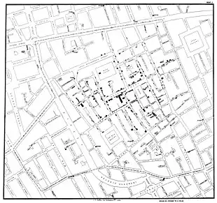 A black and white map John Snow's cholera map of the 1854 Broad Street cholera outbreak, with houses of infected people marked in black.