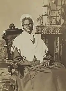 this is a restored photo of Sojourner Truth who escaped slavery and became an abolitionist and an activist for African-American civil rights, women's rights, and alcohol temperance