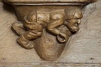 Beggar carved on a misericord