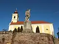 Roman Catholic church with the war memorial