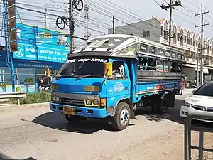 Image 190Medium-sized Isuzu Songthaew (truck bus) as seen in Samut Sakhon, Thailand. (from Combination bus)