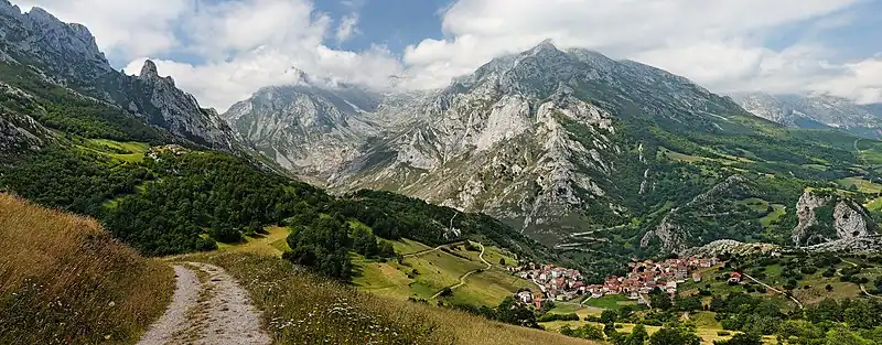 Image 17Picos de EuropaPhoto: Mick StephensonThe peaks of the Central Massif overlook the village of Sotres in Cabrales, located in the Picos de Europa, a mountain range in northern Spain forming part of the Cantabrian Mountains. The name (literally: "Peaks of Europe") is believed to derive from being the first European landforms visible to mariners arriving from the Americas.More selected pictures