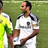 Landon Donovan holding a soccer ball in 2011 game