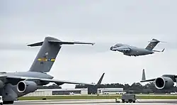 A C-17A Globemaster III of the 437th Airlift Wing taking off from Charleston AFB