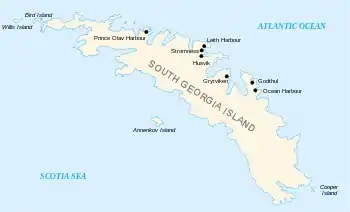 Outline map of the island of South Georgia and several offshore islands. South Georgia has a long irregular shape with many coves and deep bays. On the north shore the main whaling stations are marked: Prince Olav Harbour, Leith Harbour, Stromness, Husvik, Grytviken, Godtul and Ocean Harbour.