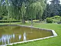 Rømerhaven. The bronze sculpture Danaiden and a mirror-pond.