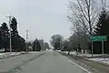 Looking east at the sign for Spring Prairie on WIS11