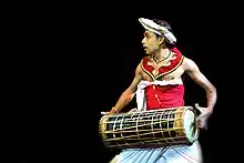 Image 3A Low Country drummer playing the traditional Yak Béra (from Sri Lanka)