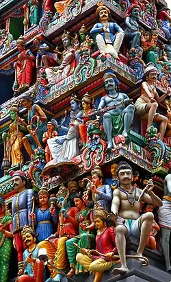 Gene-culture coevolution allows humans to develop complex artefacts like elaborately decorated temples