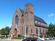 Photograph from the street looking up at St. Joseph's Catholic Church