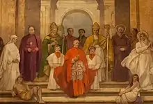 Mural painting of various religious figures together, with a cardinal in the center