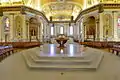 The altar from the top of the nave with the ambo and cathedra behind it