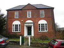 Large red brick house