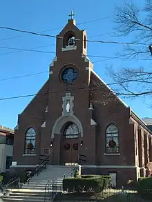 Photo of the front facade of Saint Joseph Catholic Church in  Alexandria, Virginia