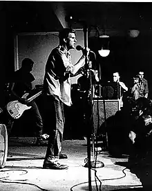 Stabb singing on stage at Washington, DC's Wilson Center in 1981